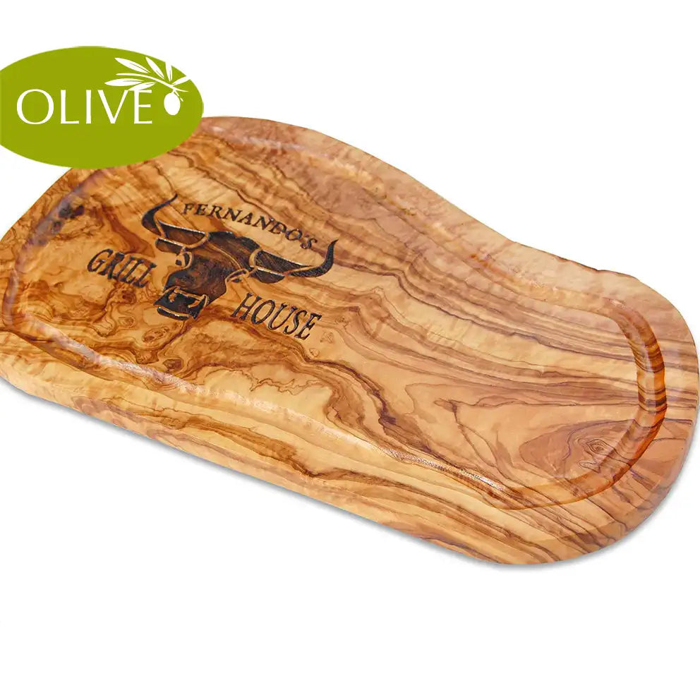 Motiv GRILL HOUSE mit Wunschnamen und stilisiertem Rinderkopf von vorne - Mediterranes Schneidebrett aus Olivenholz mit Saftrille und personalisierten Gravurmotiv - Jeske Design